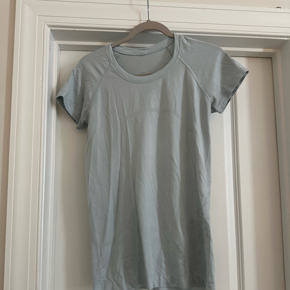 Light blue Lulu swiftly top